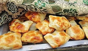 餐飲引領、生產(chǎn)接力，新疆風味烤包子風靡全國
